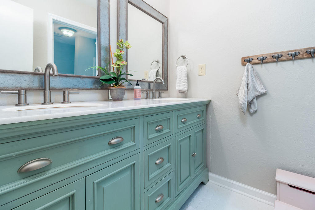 2135 Semur Road Pensacola, FL 32503 - Photo 24 of 37 a bathroom with a sink double vanity and a mirror