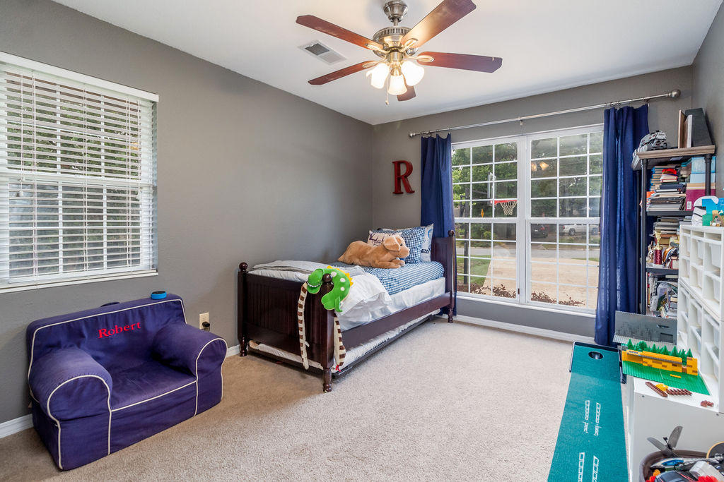 2135 Semur Road Pensacola, FL 32503 - Photo 26 of 37 a bedroom with furniture and a large window