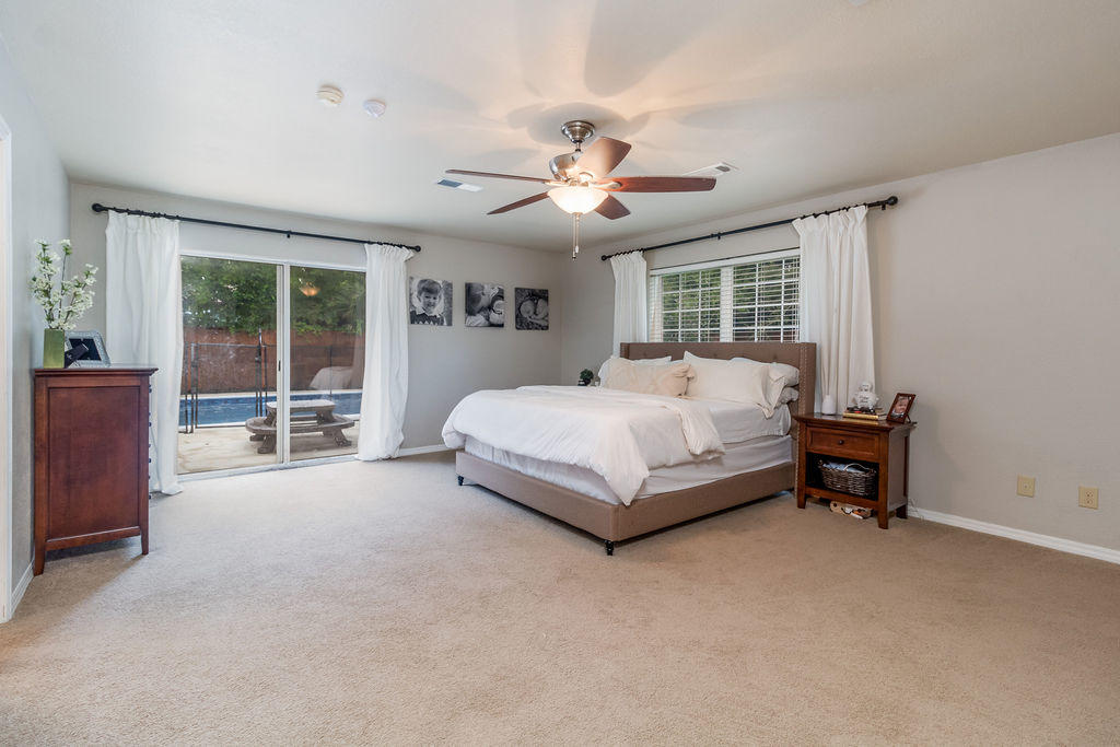 2135 Semur Road Pensacola, FL 32503 - Photo 31 of 37 a bed sitting in a spacious bedroom next to a window