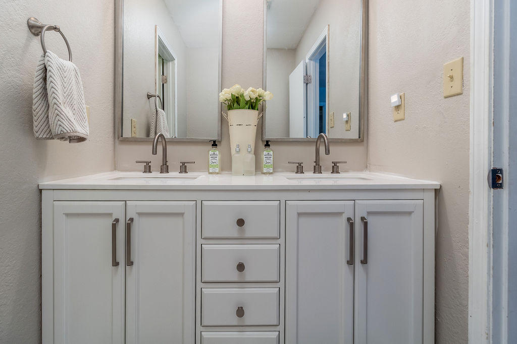 2135 Semur Road Pensacola, FL 32503 - Photo 36 of 37 a bathroom with double vanity sink and two mirror