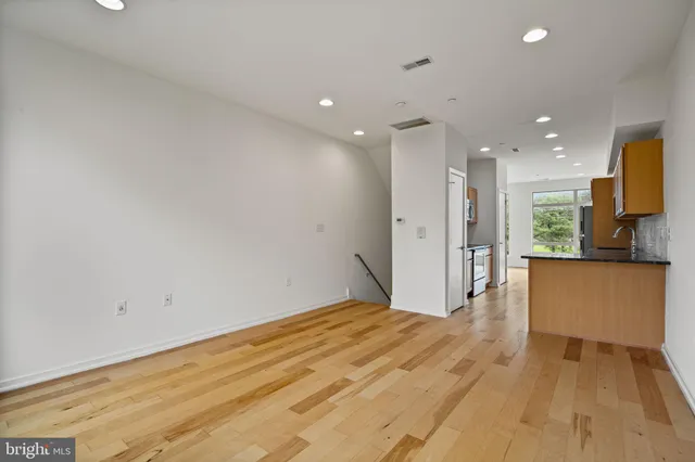 a view of kitchen with wooden floor