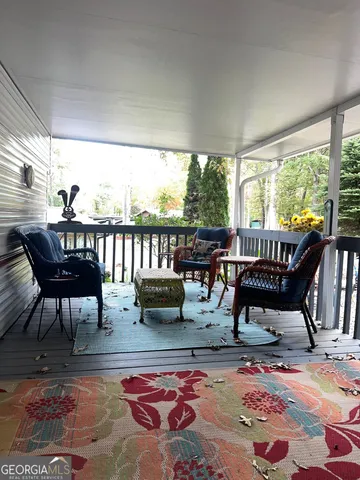 a view of a patio with swimming pool