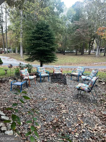 a view of a lake with outdoor space