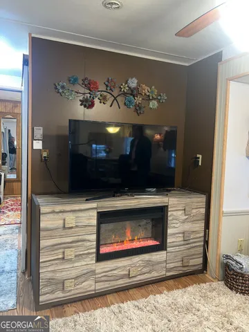 a stove top oven sitting inside of a kitchen