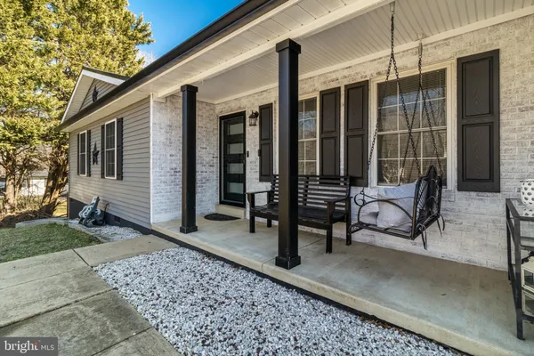 a view of a two chair in the patio