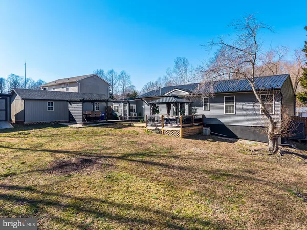 a front view of a house with swimming pool