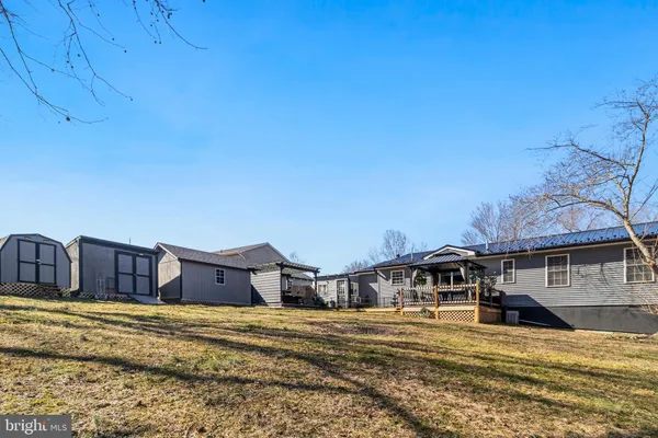 a swimming pool with outdoor seating