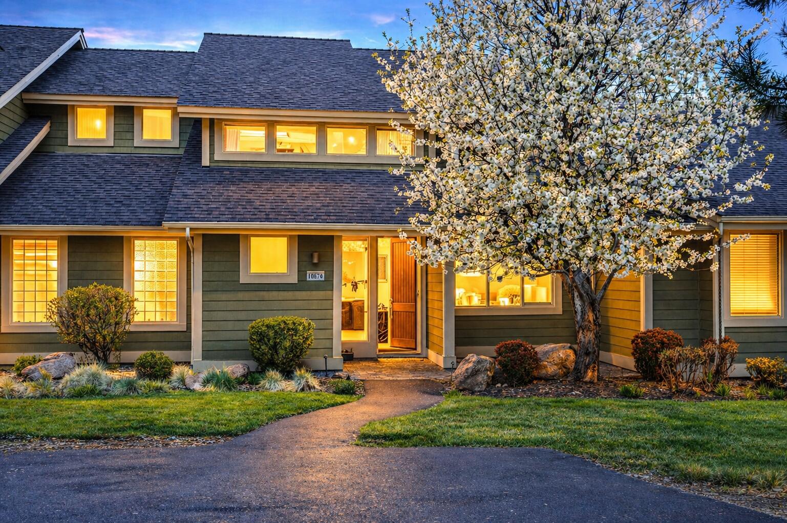 10870 Village Loop Redmond, OR 97756 - Photo 1 of 35 a view of a house with a patio and a yard