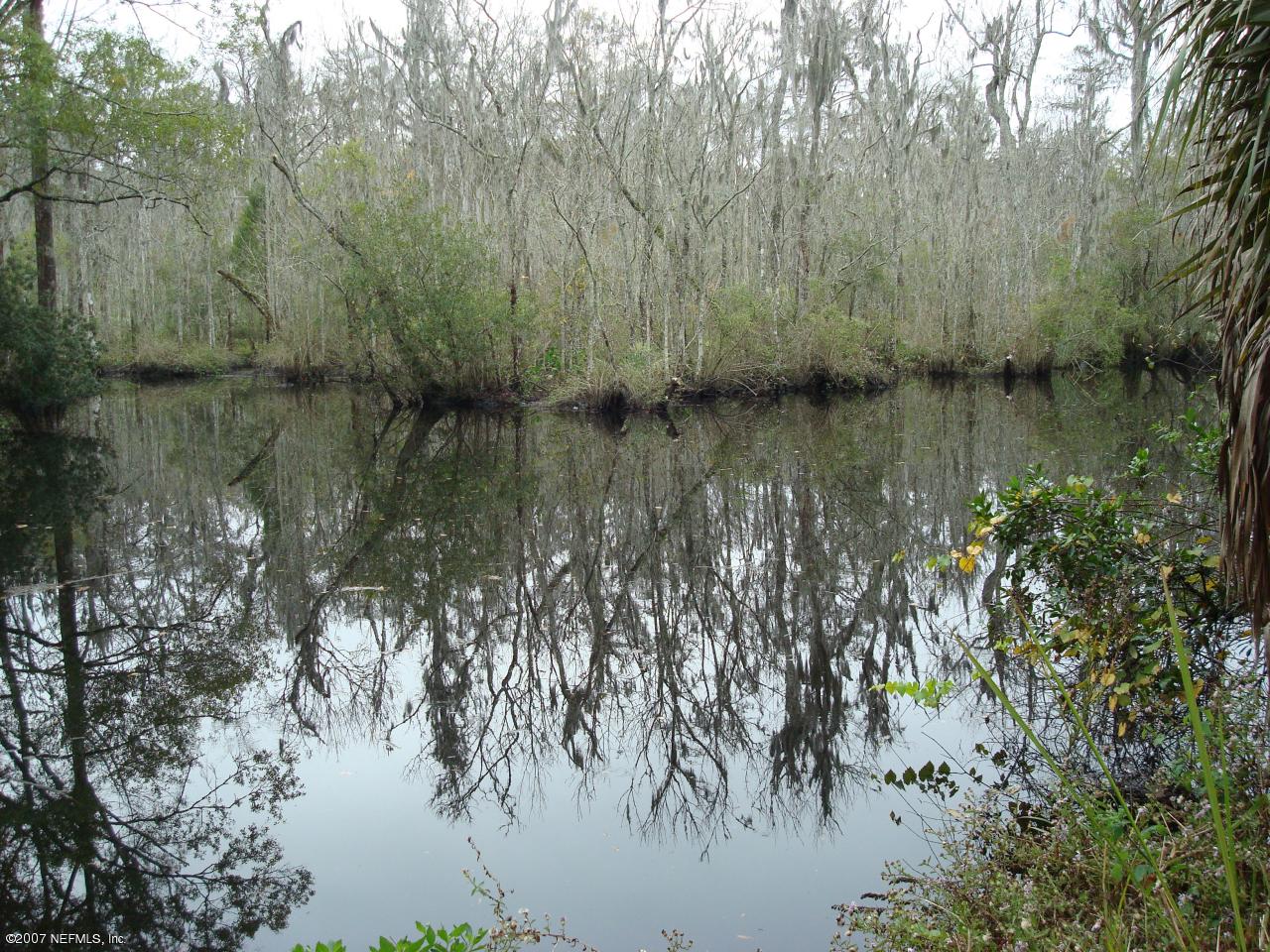 8432 Hogan Road Jacksonville, FL 32216 - Photo 3 of 13 Pottsburg Creek