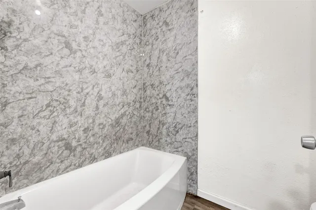 a bathroom with a bathtub