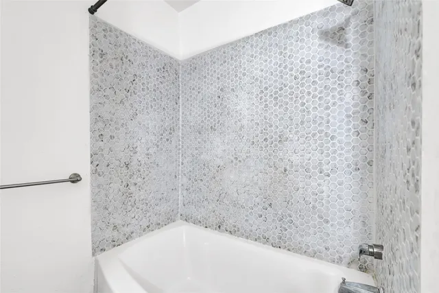 a bathroom with a bathtub