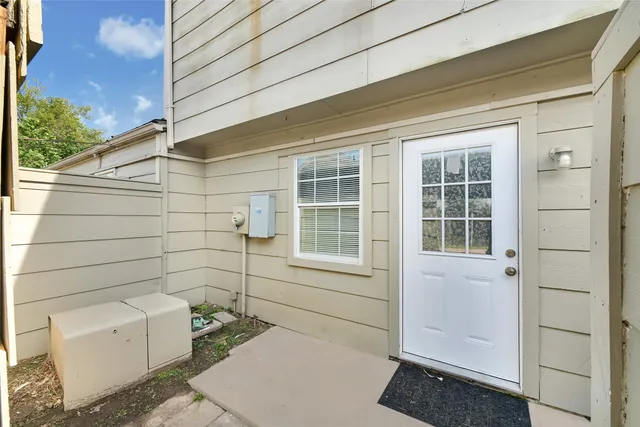 a house view with a garden space