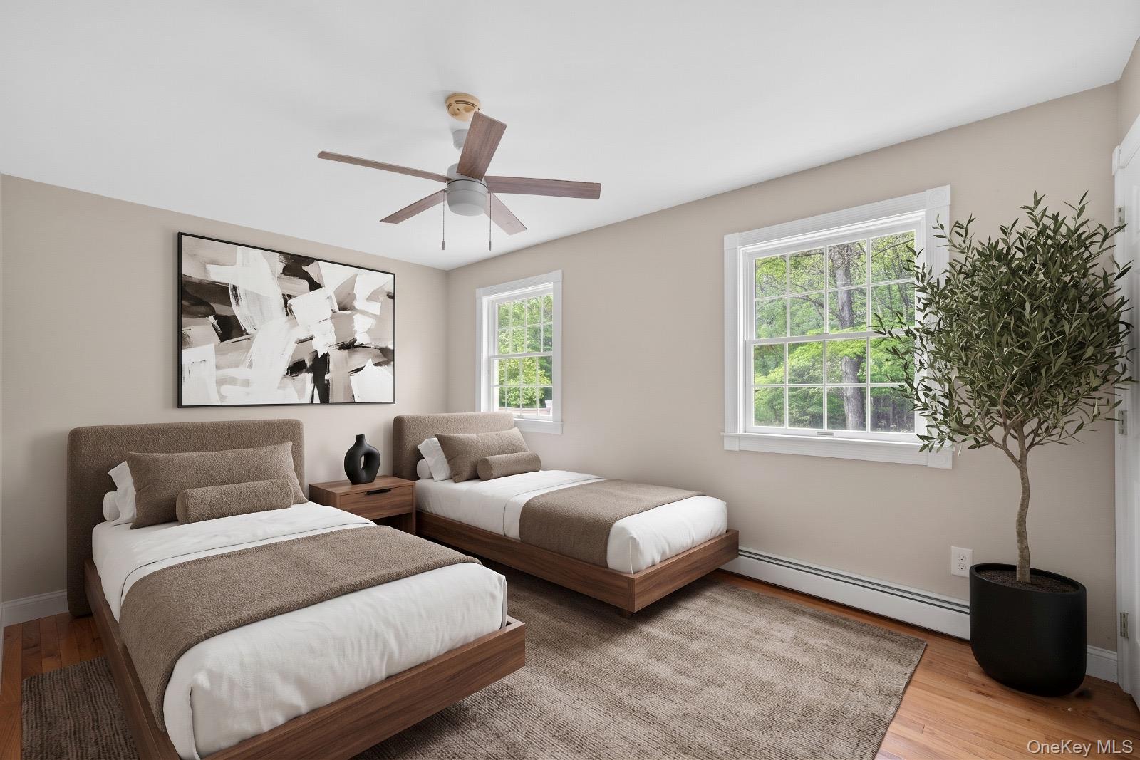 16 Sunset Ridge Monroe, NY 10950 - Photo 8 of 14 a bedroom with two beds and a potted plant
