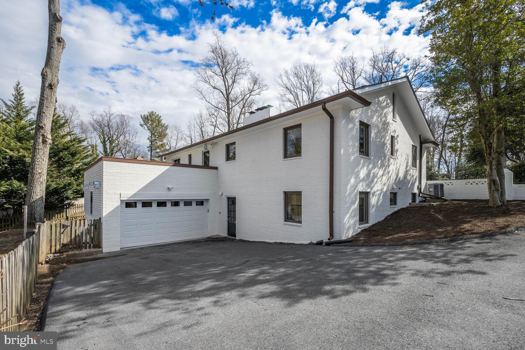 6211 Poe Road Bethesda, MD 20817 - Photo 3 of 42 Huge Driveway and Oversized One-Car Garage