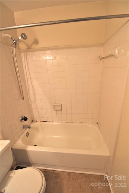 11072 Cedar View Road Charlotte, NC 28226 - Photo 12 of 18 a bathroom with a bathtub and a shower