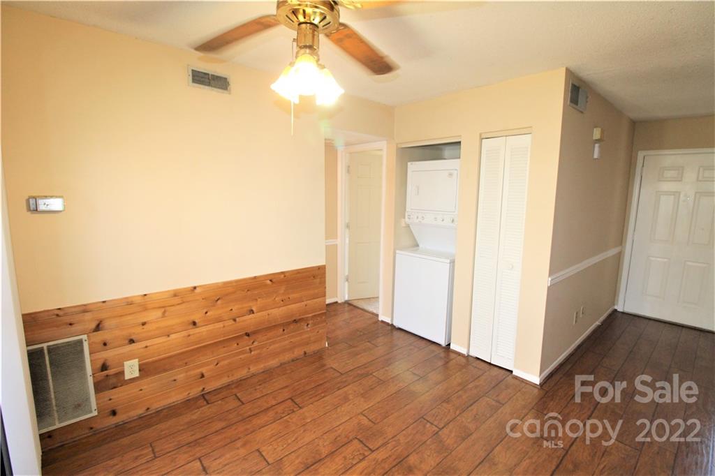 11072 Cedar View Road Charlotte, NC 28226 - Photo 9 of 18 a view of empty room with wooden floor