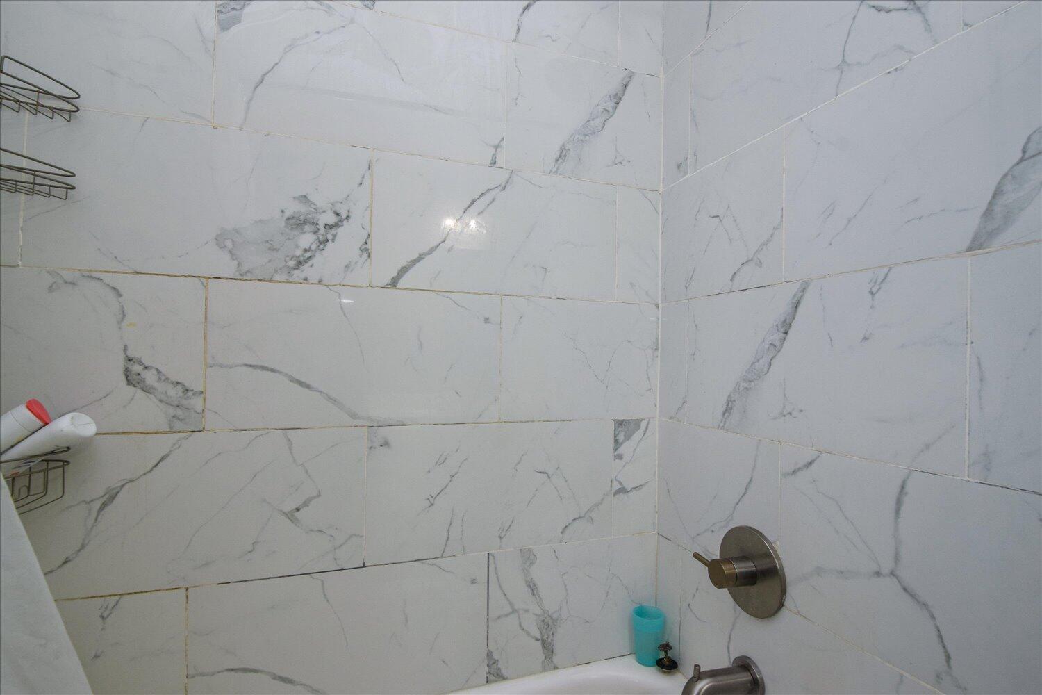 1316 Dudley Road Moneta, VA 24121 - Photo 23 of 37 a bathroom with a bathtub