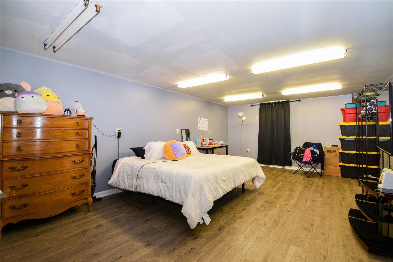 1316 Dudley Road Moneta, VA 24121 - Photo 24 of 37 a bedroom with a bed and a closet