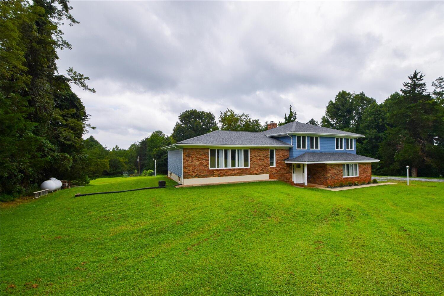 1316 Dudley Road Moneta, VA 24121 - Photo 27 of 37 a view of a house with a big yard