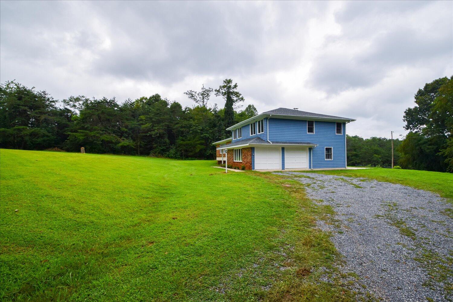 1316 Dudley Road Moneta, VA 24121 - Photo 29 of 37 a view of a house with a yard
