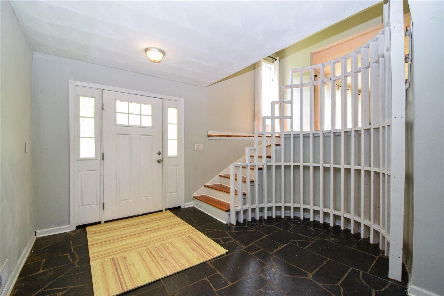 1316 Dudley Road Moneta, VA 24121 - Photo 4 of 37 a bedroom with windows