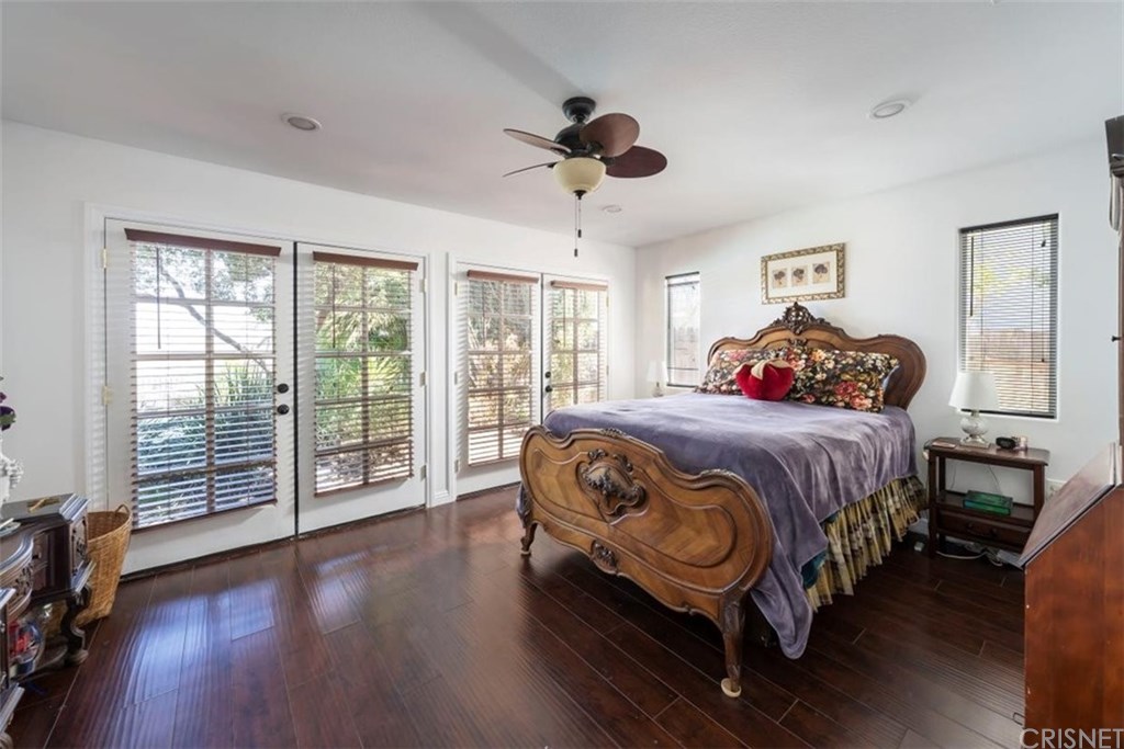 19701 Green Mountain Drive Newhall, CA 91321 - Photo 26 of 37 Main bedroom with doors to take in the view of the pool and amazing view.