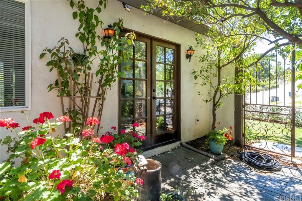 19701 Green Mountain Drive Newhall, CA 91321 - Photo 10 of 37 Front Courtyard has double door entrance to one of the 3 bedrooms.