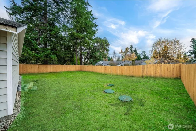 a view of backyard with green space