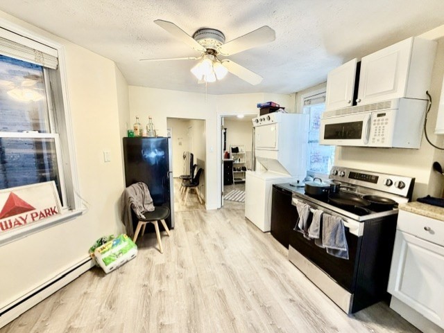 14 Cleveland Place, Unit 2 Boston, MA 02113 - Photo 5 of 18 a kitchen with a sink appliances and cabinets