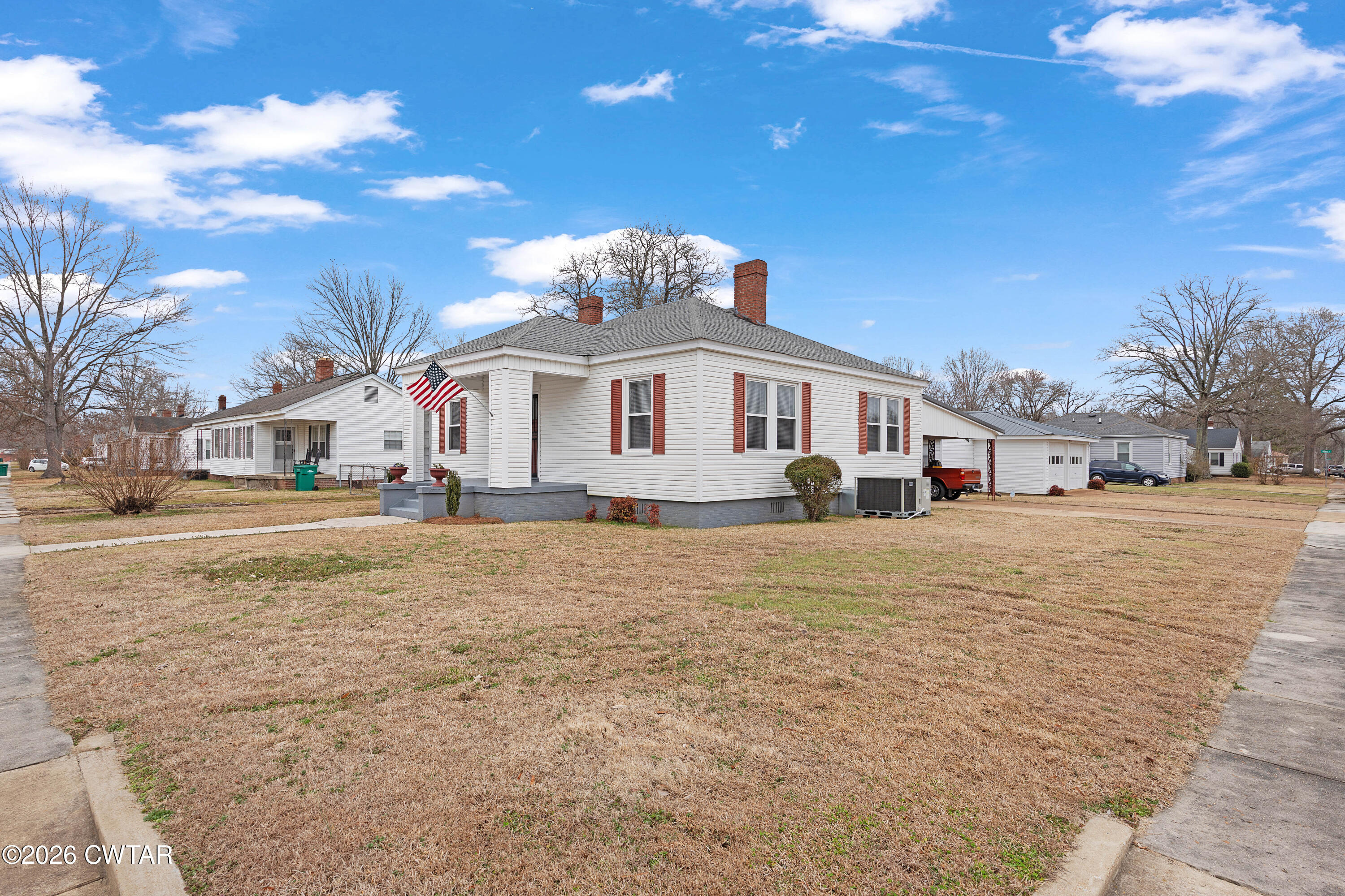 2 Gregg Street Jackson, TN 38301 - Photo 2 of 18 a front view of a house with a yard