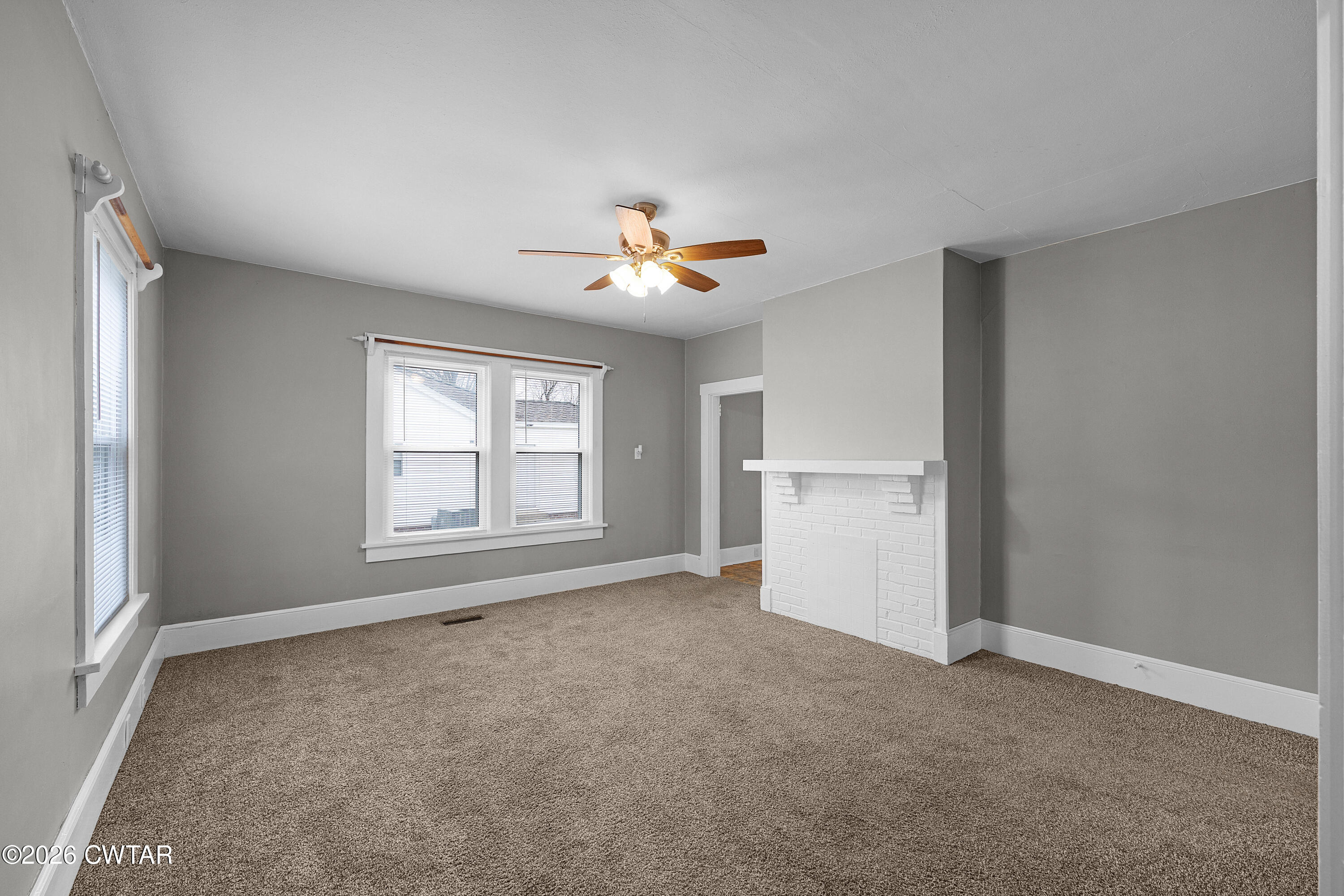 2 Gregg Street Jackson, TN 38301 - Photo 6 of 18 an empty room with closet and a ceiling fan