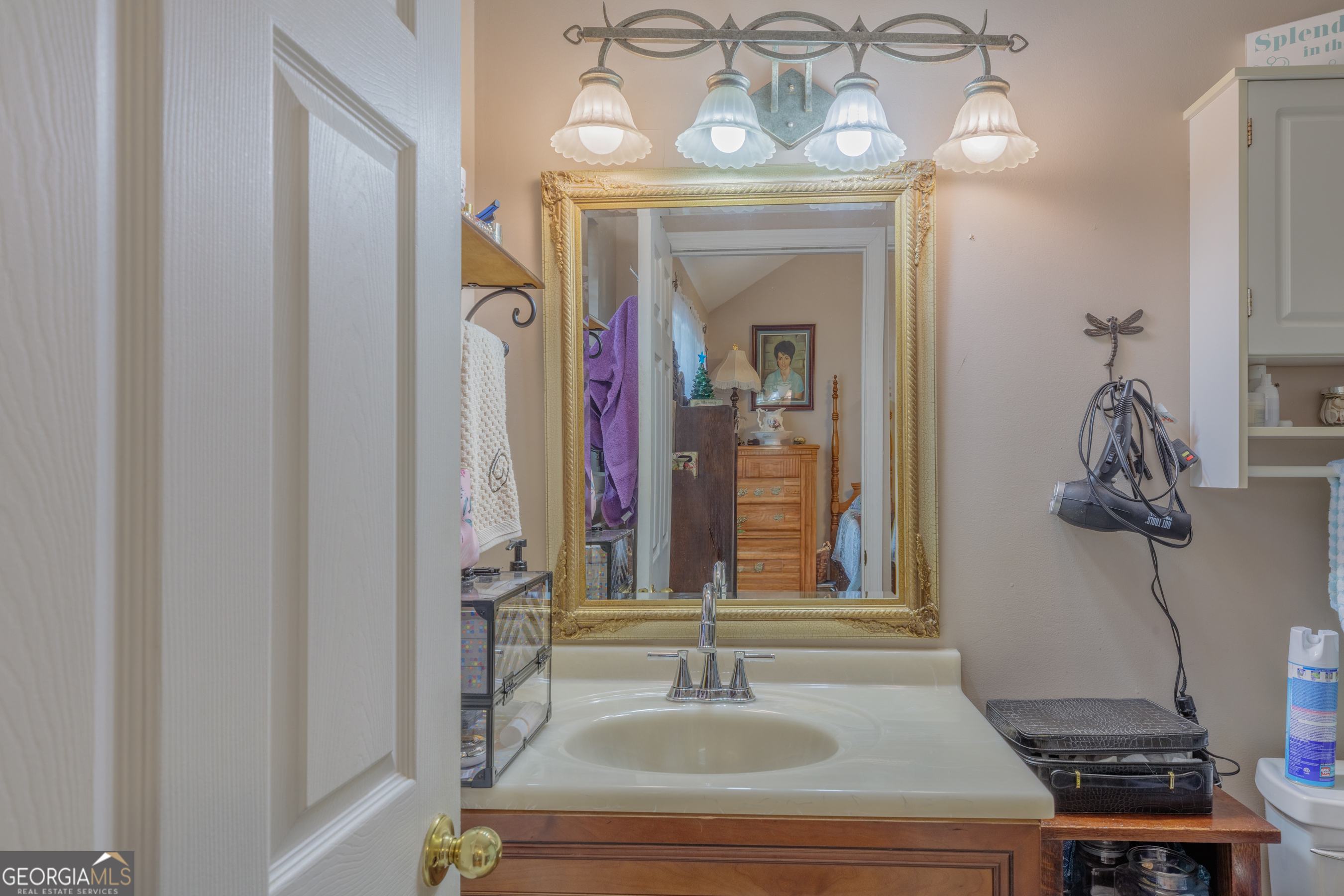765 Greenbush Road LaFayette, GA 30728 - Photo 16 of 68 a bathroom with a sink and a mirror