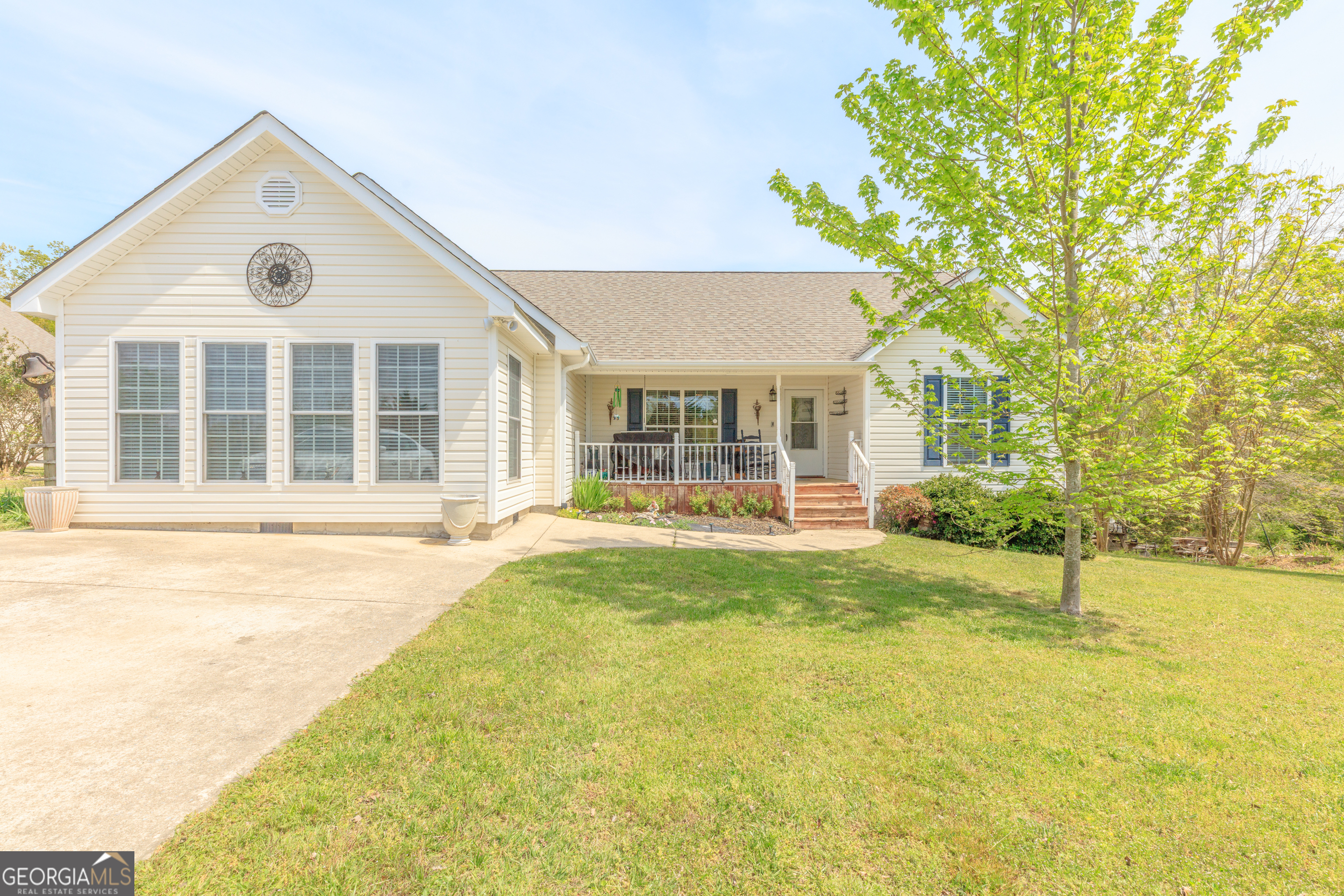 765 Greenbush Road LaFayette, GA 30728 - Photo 2 of 68 a view of a house with pool and sitting area