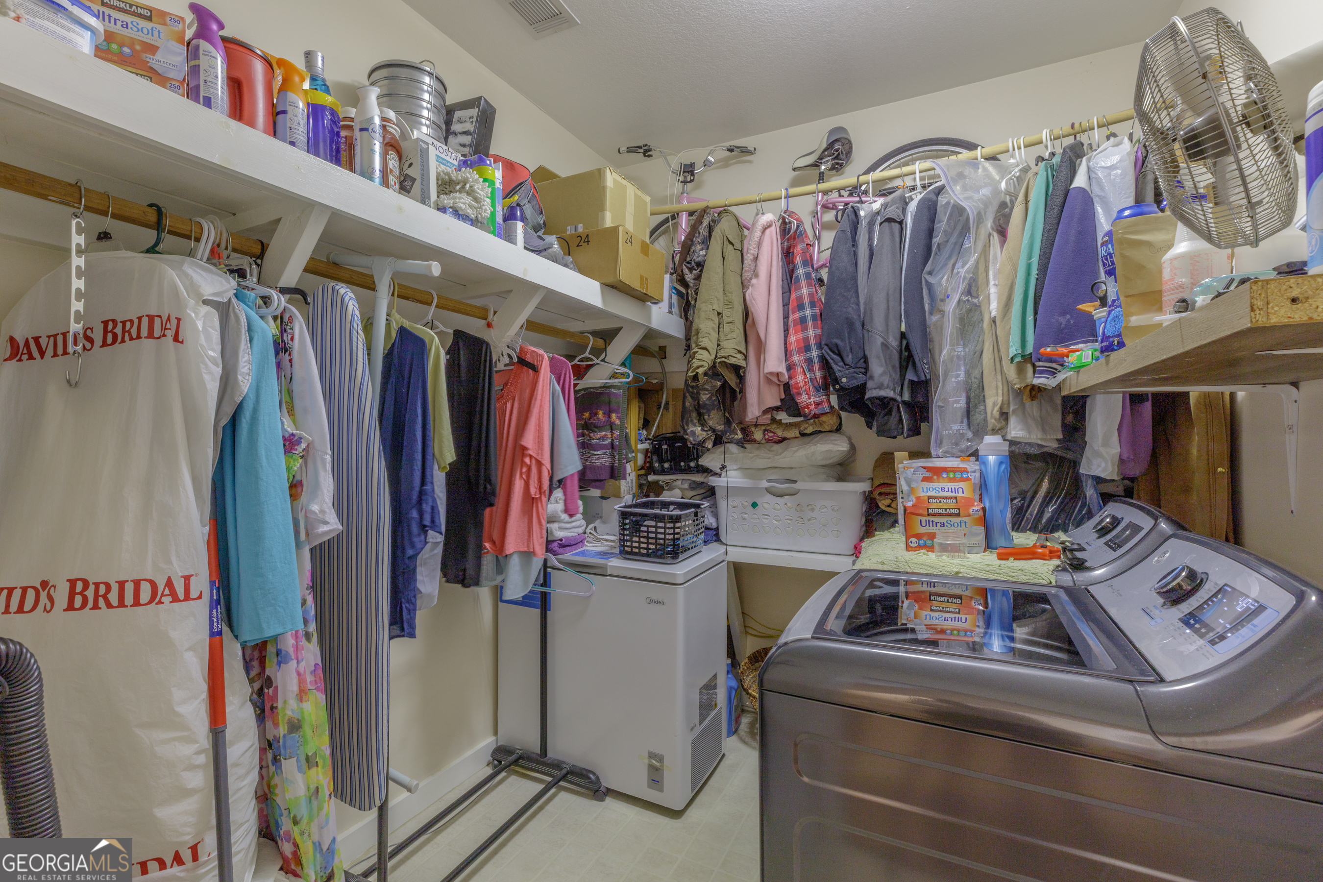 765 Greenbush Road LaFayette, GA 30728 - Photo 22 of 68 a view of walk in closet with clothes