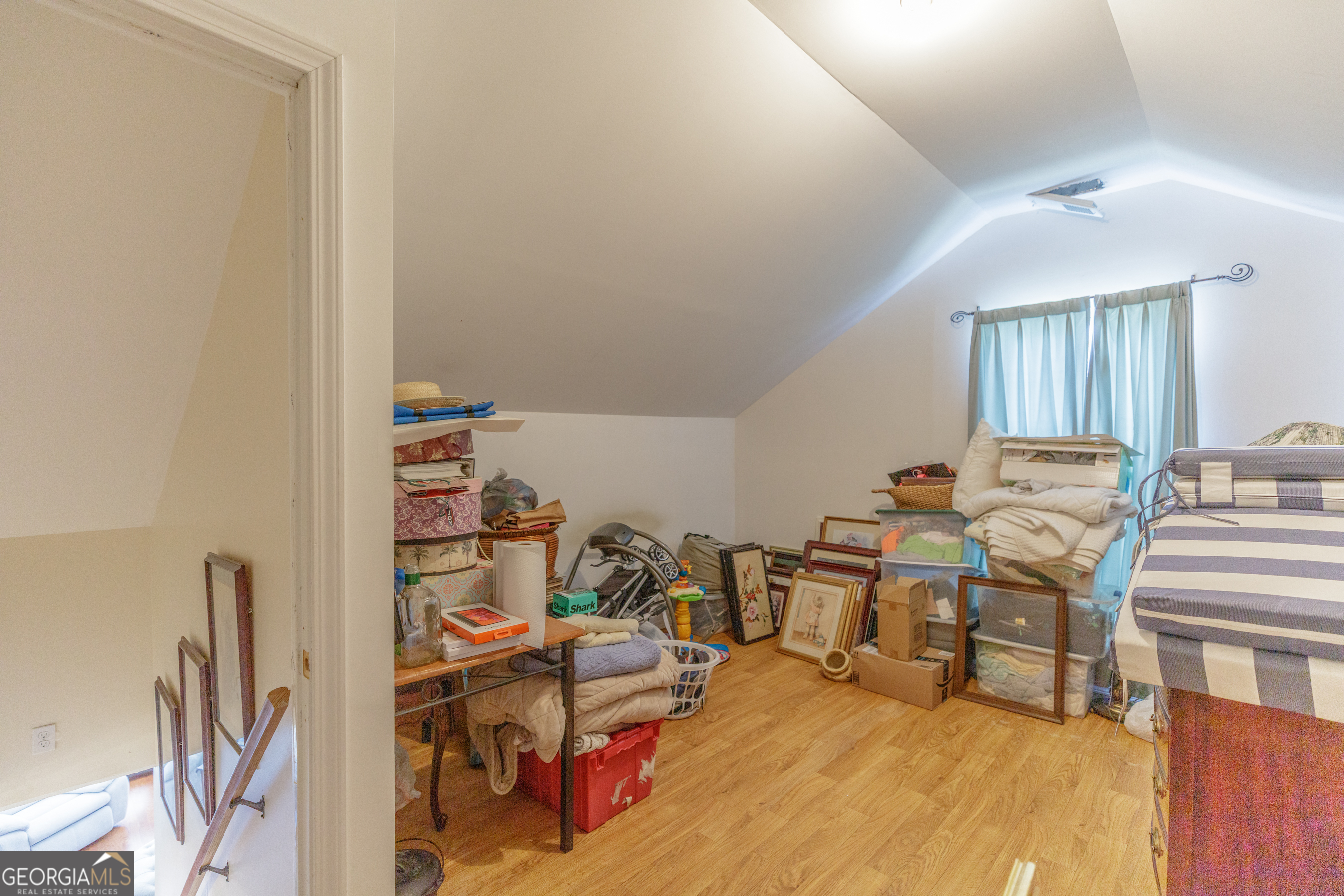 765 Greenbush Road LaFayette, GA 30728 - Photo 28 of 68 a room with lots of white furniture and a wooden floor