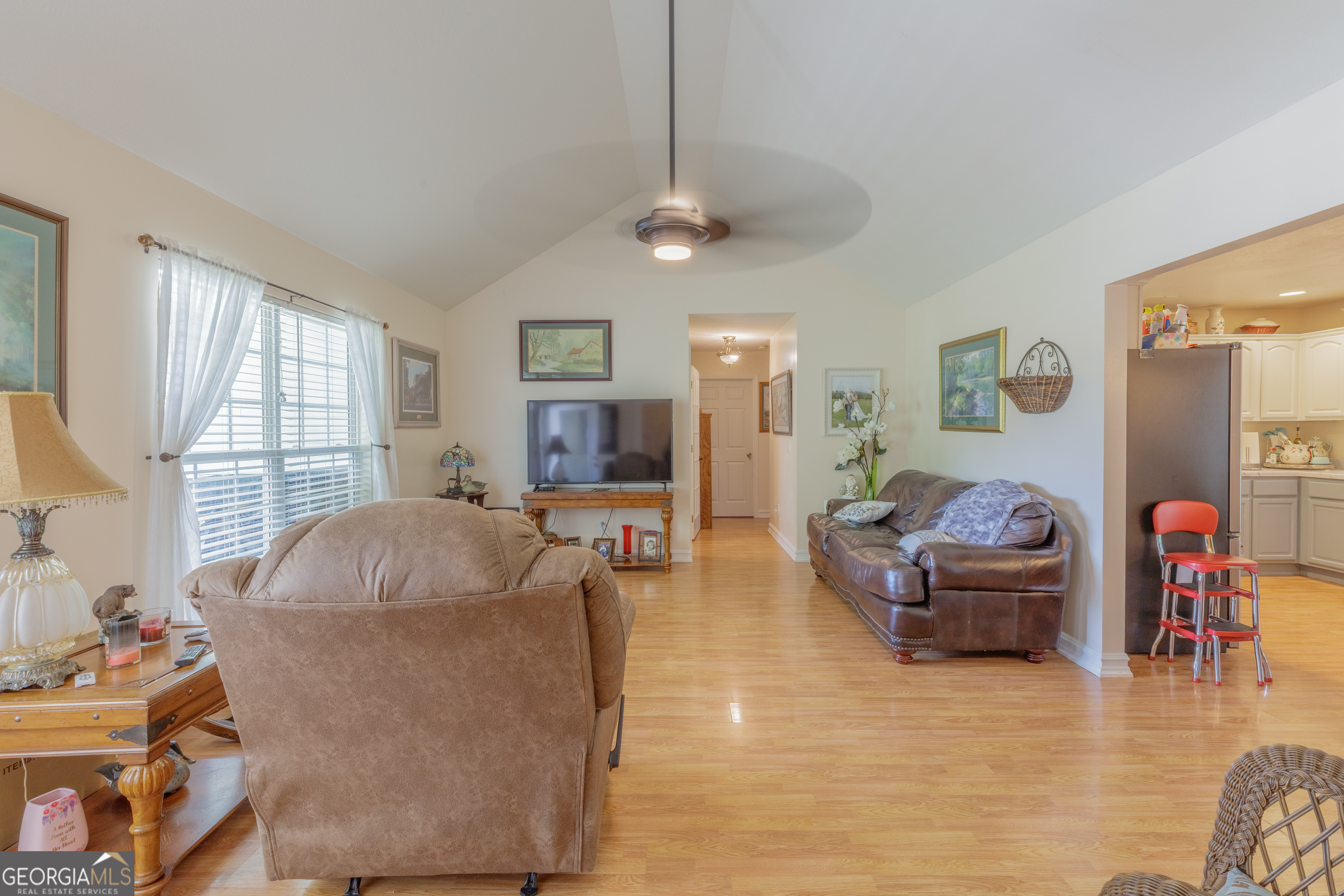 765 Greenbush Road LaFayette, GA 30728 - Photo 38 of 68 a living room with furniture large window and wooden floor