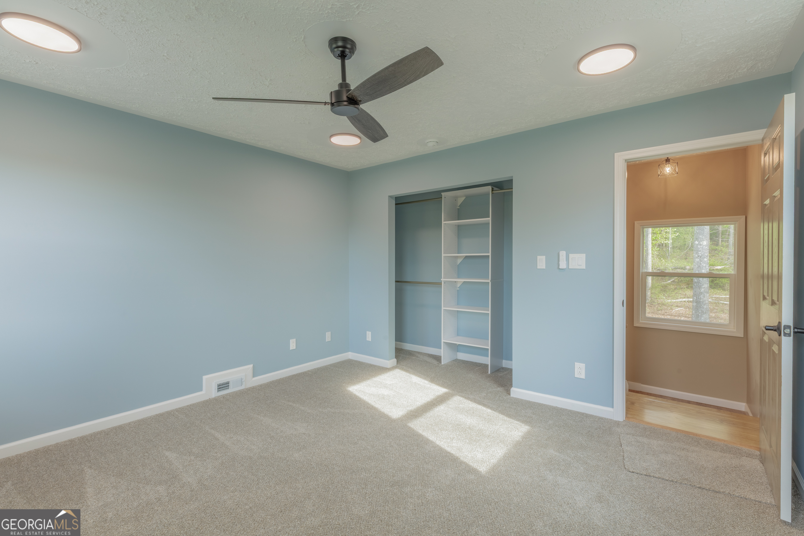 765 Greenbush Road LaFayette, GA 30728 - Photo 43 of 68 an empty room with closet and windows