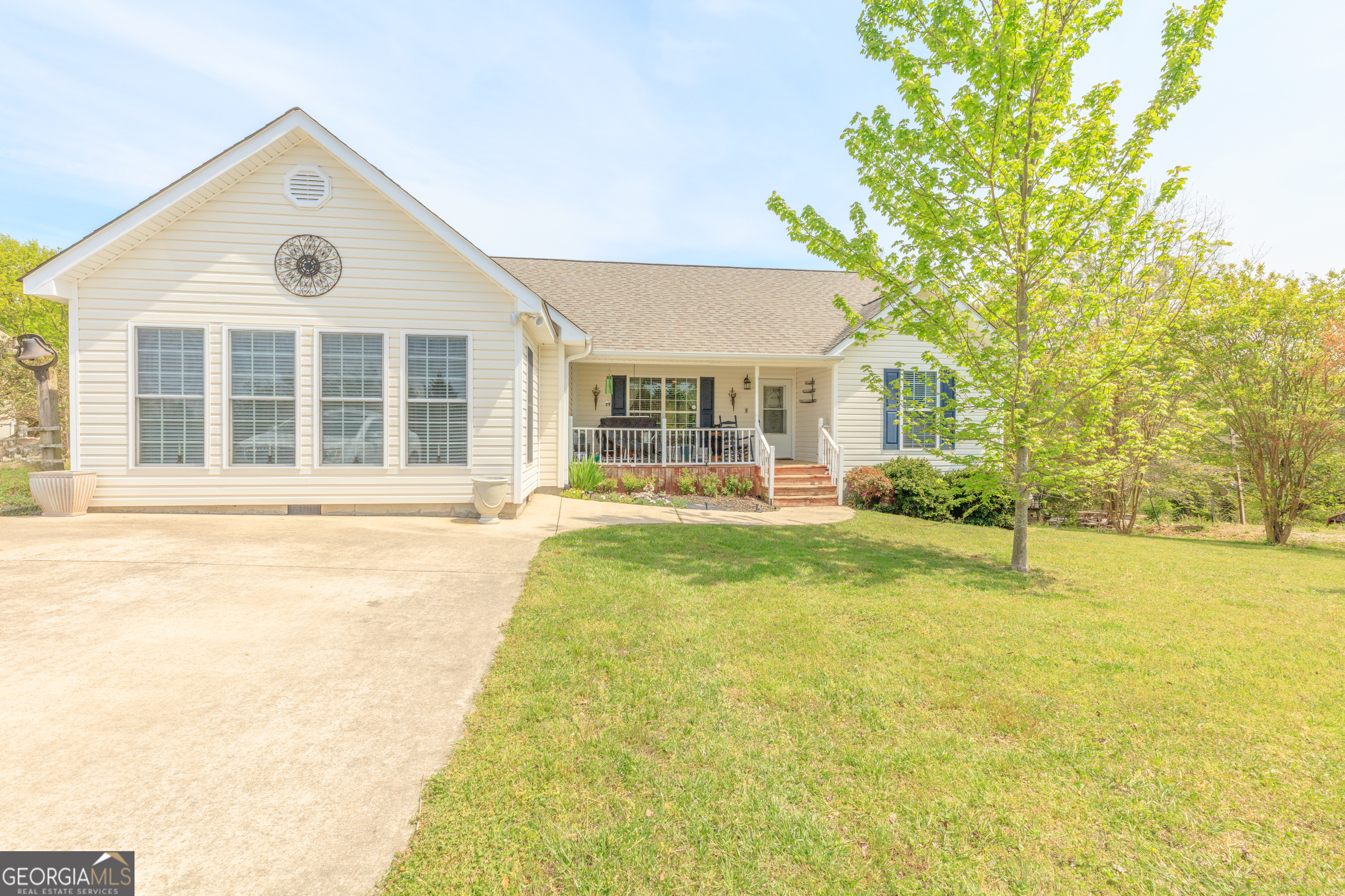 765 Greenbush Road LaFayette, GA 30728 - Photo 55 of 68 a front view of a house with a yard
