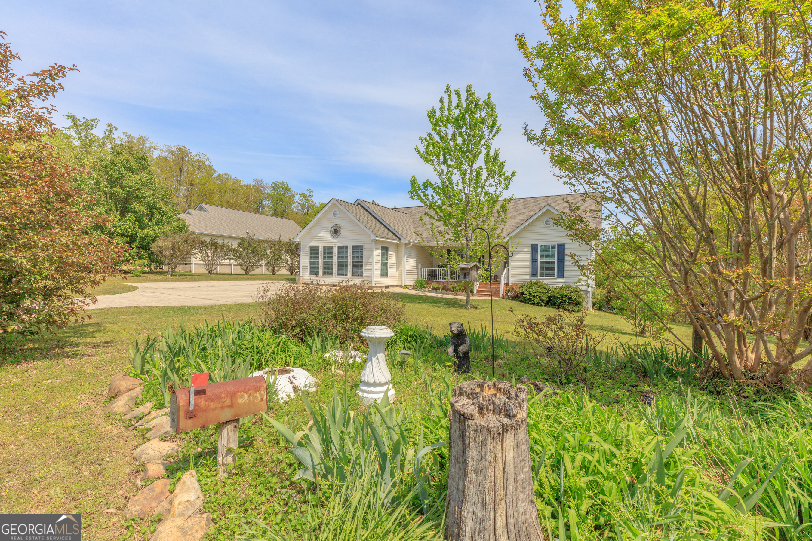 765 Greenbush Road LaFayette, GA 30728 - Photo 57 of 68 a front view of a house with a yard and swimming pool
