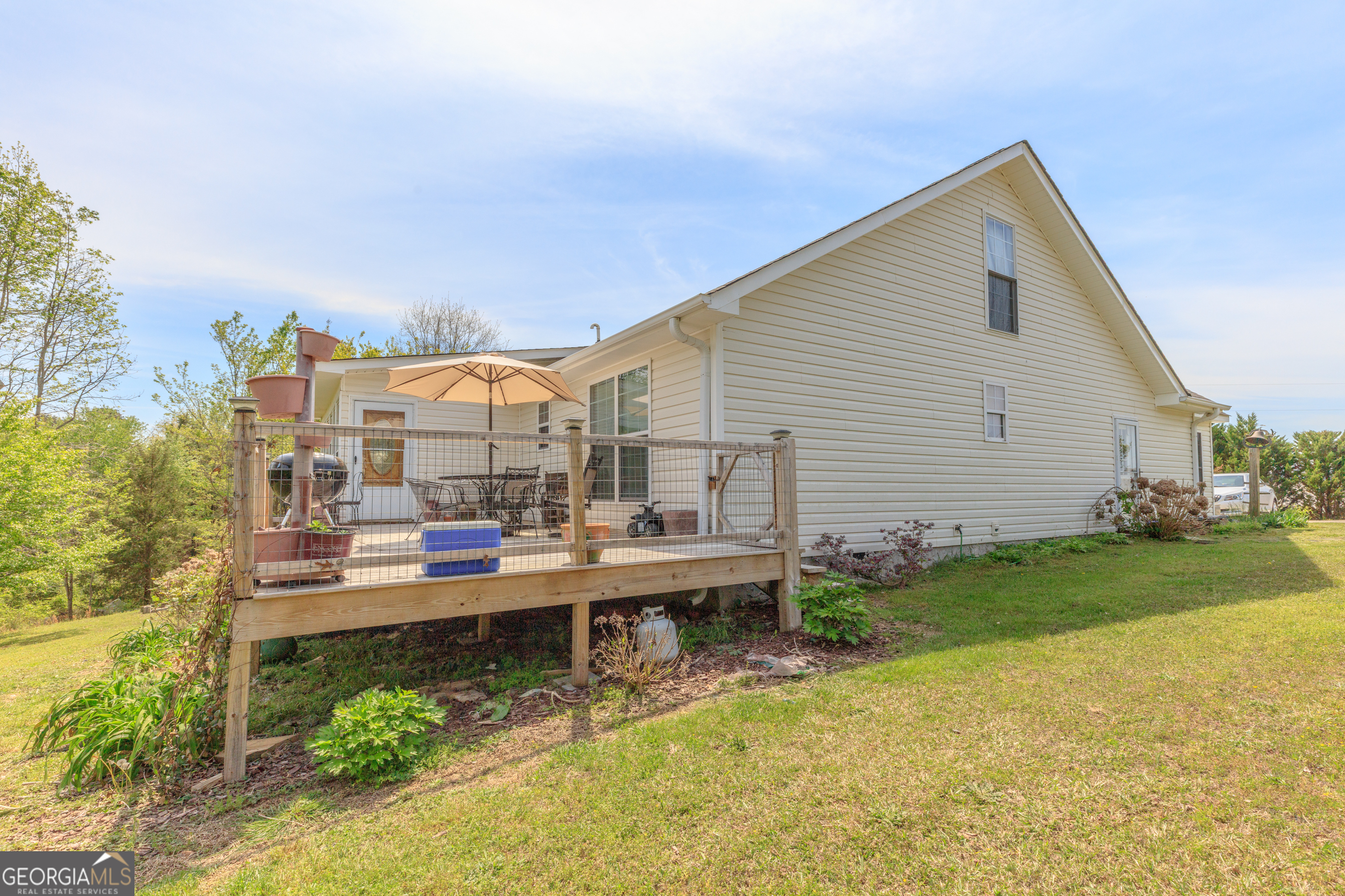 765 Greenbush Road LaFayette, GA 30728 - Photo 66 of 68 a view of a house with backyard and sitting area