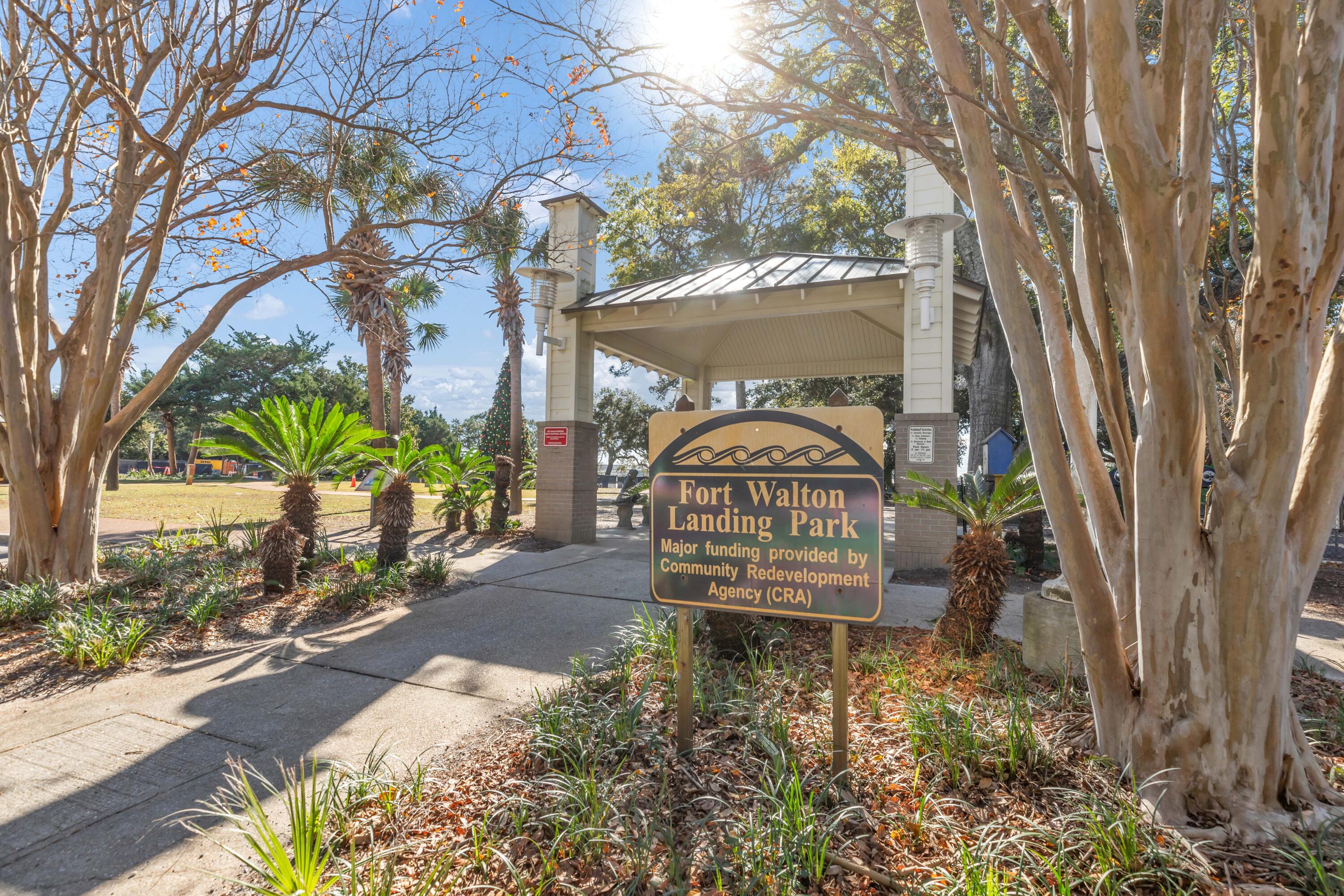 159 Brooks Street Southeast, Unit 207 Fort Walton Beach, FL 32548 - Photo 28 of 30 a view of a bench in a garden