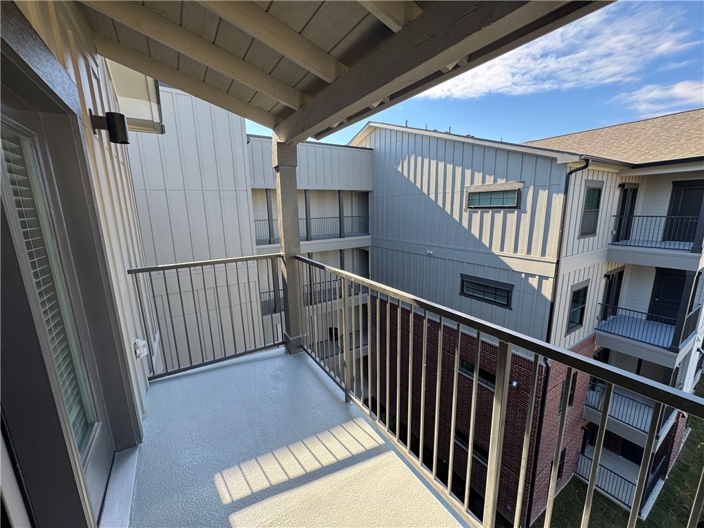6000 Jones Road, Unit 4211 Bryan, TX 77807 - Photo 19 of 19 a view of balcony with wooden floor