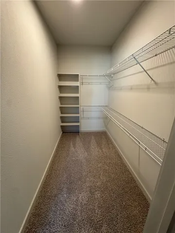 a bathroom with a sink mirror vanity and toilet
