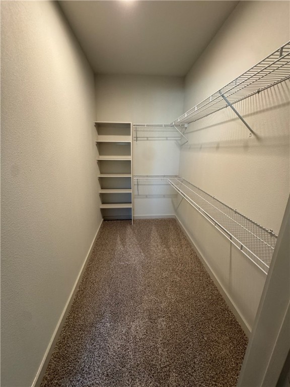 6000 Jones Road, Unit 4211 Bryan, TX 77807 - Photo 12 of 19 a storage room with empty racks