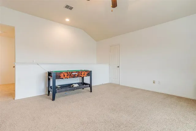 a hallway with a bench