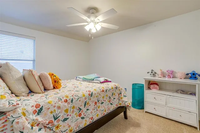 a bedroom with a bed and closet