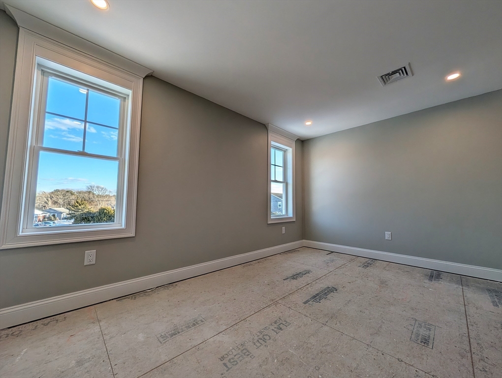 46 Holt Road, Unit B Bourne, MA 02532 - Photo 15 of 22 a view of an empty room with a window