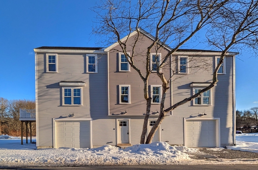 46 Holt Road, Unit B Bourne, MA 02532 - Photo 5 of 22 a house view with a outdoor space
