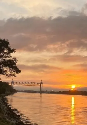 a view of a balcony with ocean view