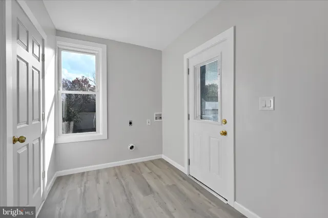 a kitchen with stainless steel appliances granite countertop a stove and a refrigerator